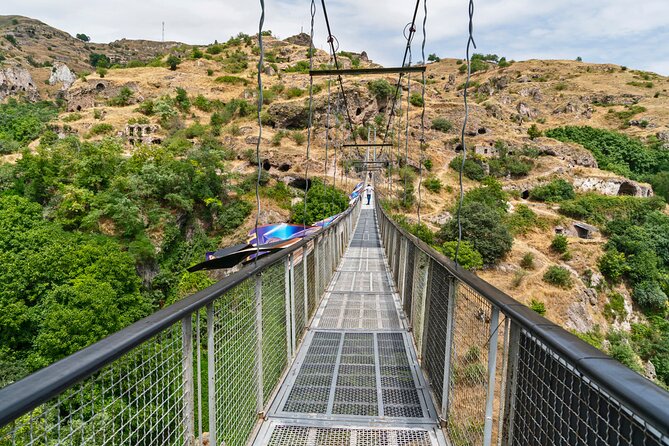Group Tour: Hin Areni Winery, Tatev (wayback on Ropeway), Khndzoresk Caves - Exploring the caves and bridge at Khndzoresk