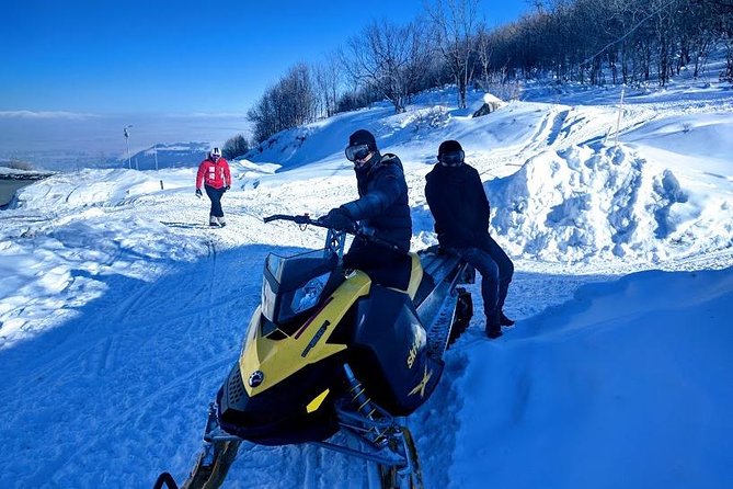 Multi-Day Winter Sightseeing Tour in Armenia - Noravank: red cliffs against winter snow